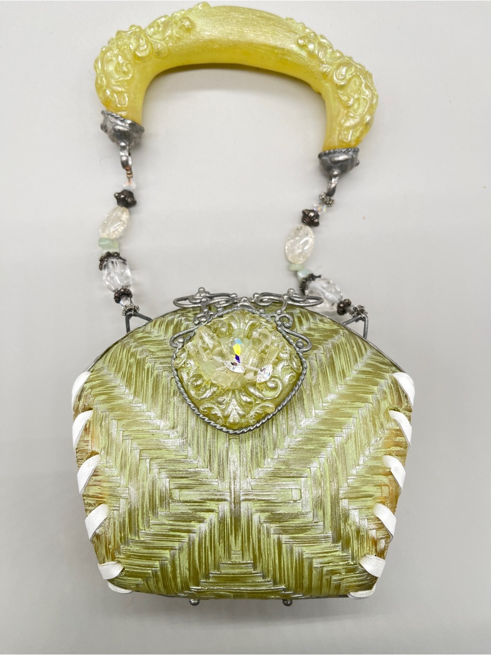 Vintage Maya Evangalista sage green resin bag that is highly decorated. Like new